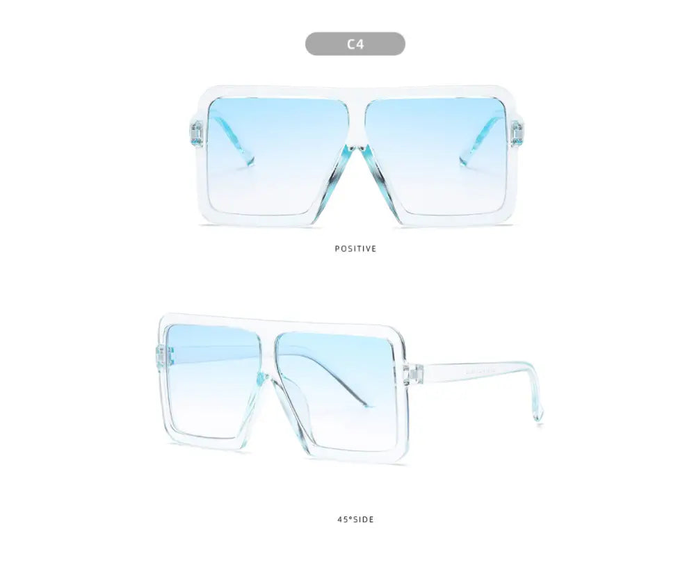 Clear plastic-framed oversized square sunglasses with light blue gradient translucent UV400 lenses for fashion use.