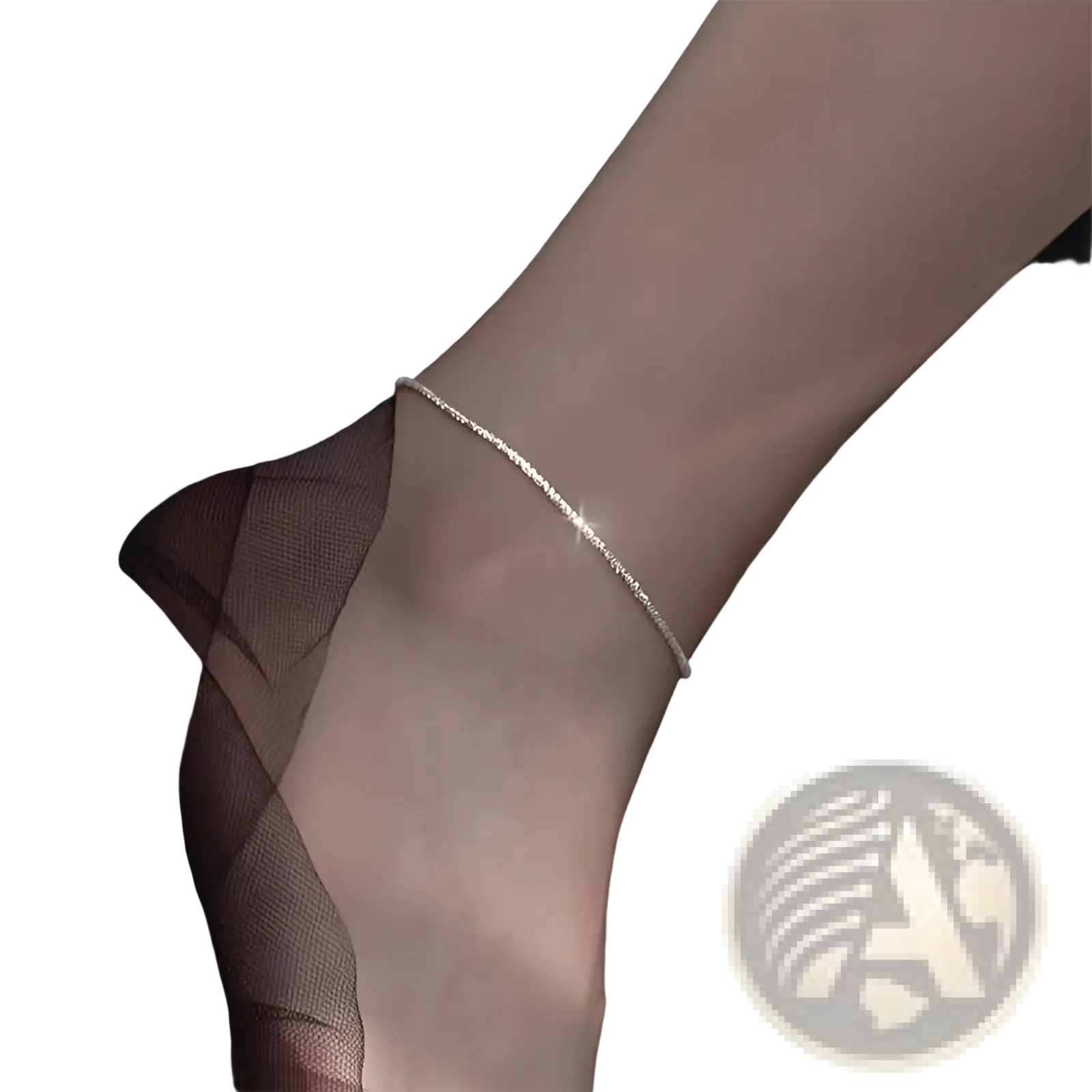 A delicate adjustable 925 silver sparkling crystal anklet with a subtle textured pattern elegantly wrapped around the ankle