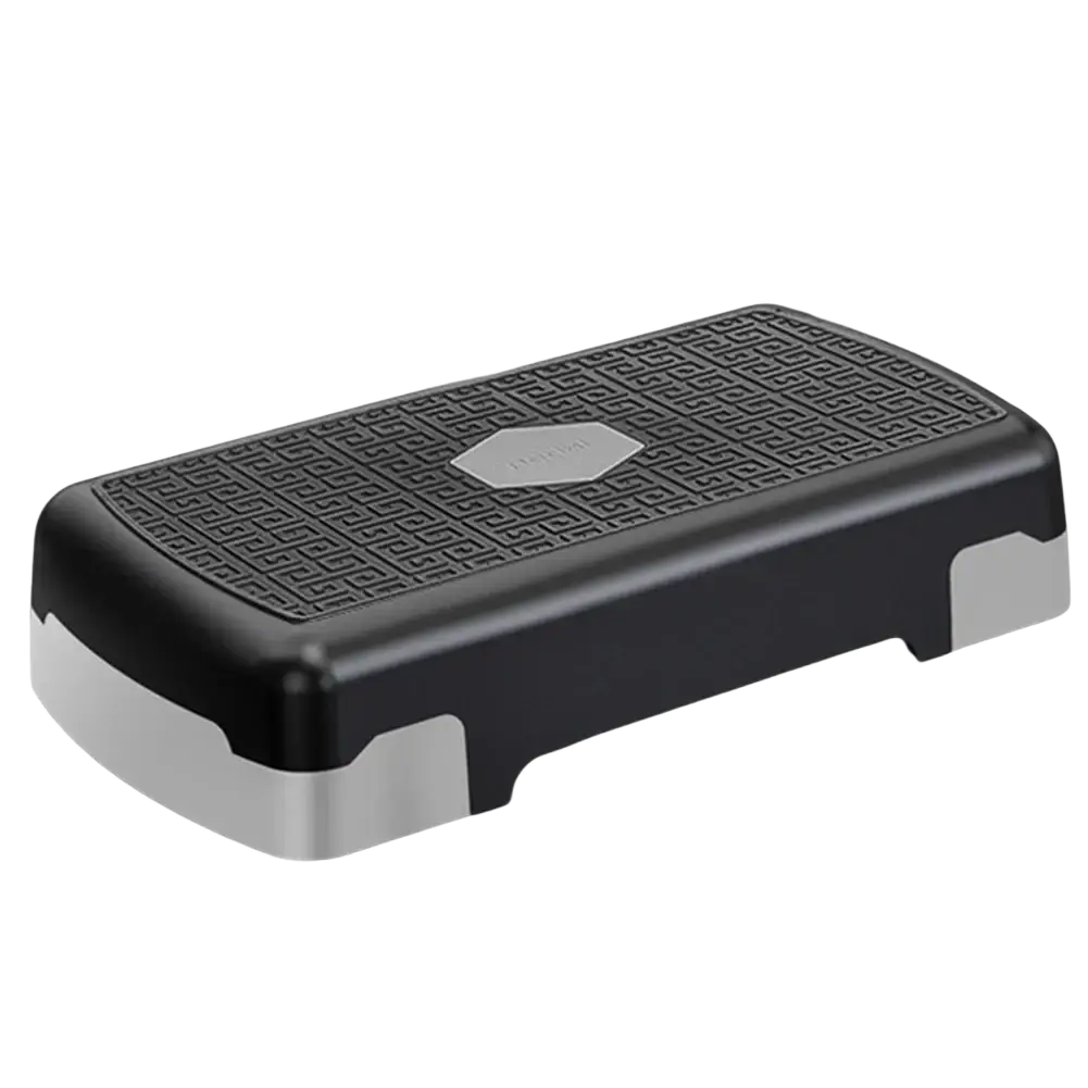 Adjustable aerobic fitness stepper in black and silver with a textured patterned top surface supporting 200kg load
