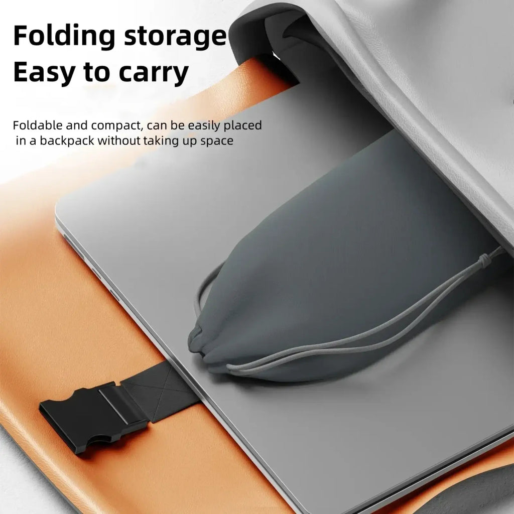 Gray foldable laptop sleeve with black strap and drawstring closure for adjustable aluminum ergonomic laptop stand