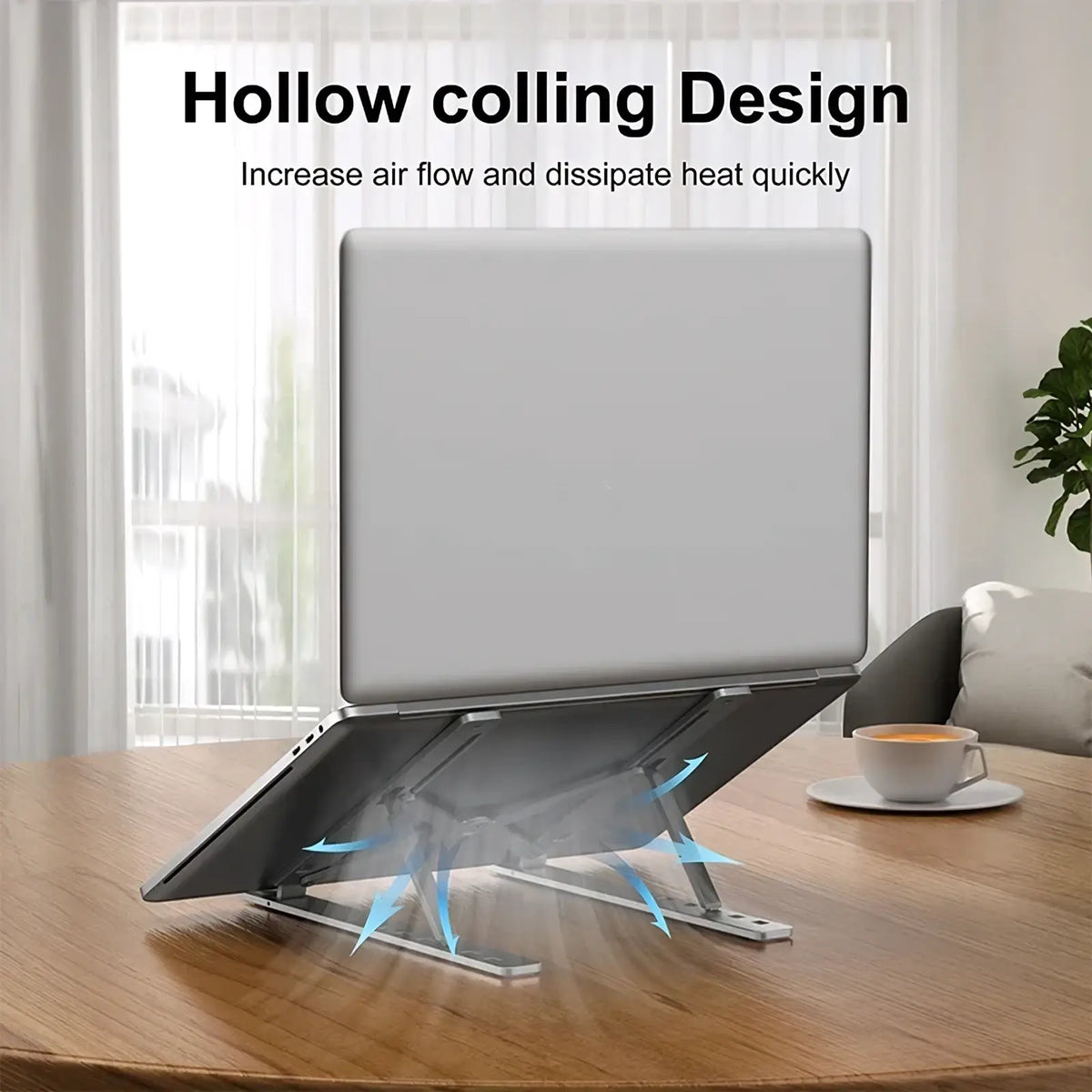 Adjustable aluminum laptop stand in silver with foldable holder and hollow cooling design for efficient heat dissipation