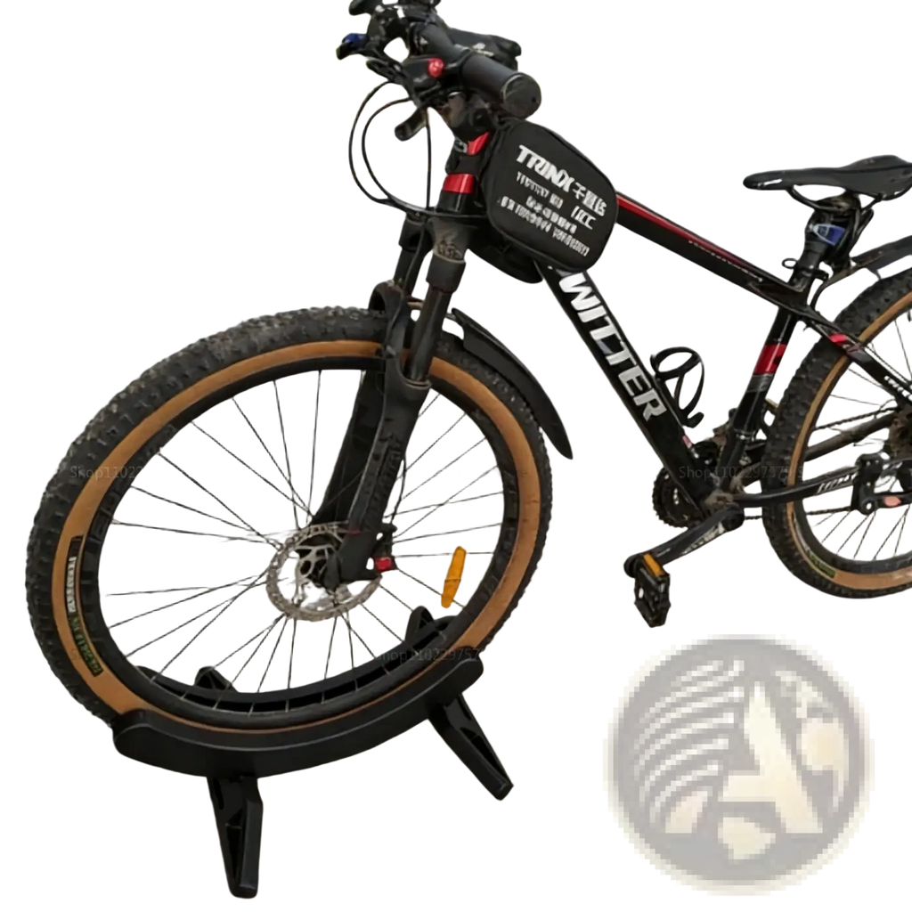 Adjustable bike parking stand holding a black mountain bike with red accents tan tires front suspension and disc brakes