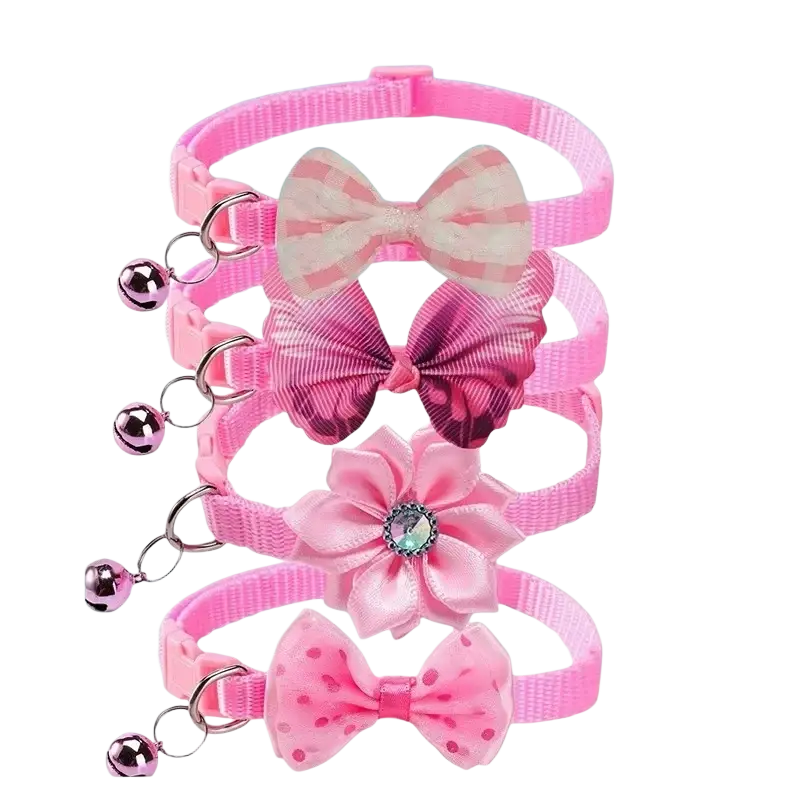 Adjustable pink cat collar with bow and dangling bell made of soft fabric for everyday use