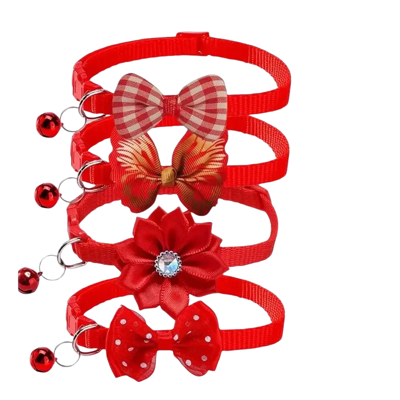 Adjustable red fabric bow cat collar with bell designed for comfort and style during daily wear