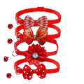Adjustable red bow cat collars with bells featuring decorative bows for a stylish and secure pet accessory