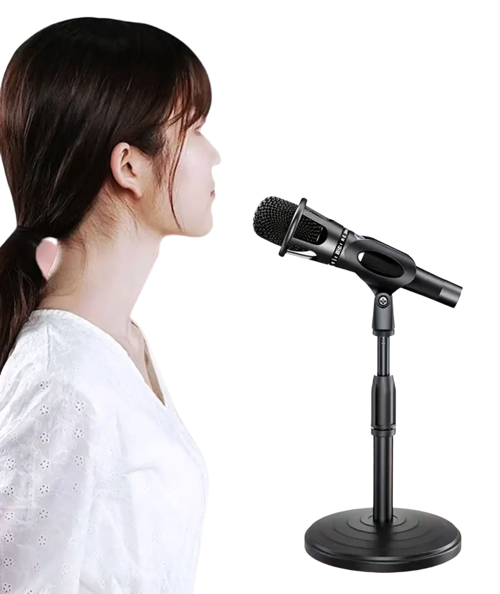 Black handheld microphone with mesh grille and ergonomic grip mounted on adjustable desktop microphone stand and holder