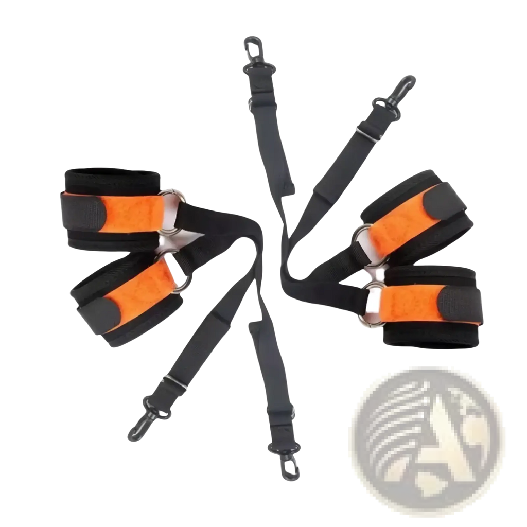 Adjustable fabric wrist cuffs in orange and black with metal buckles and clasps for secure bondage restraint