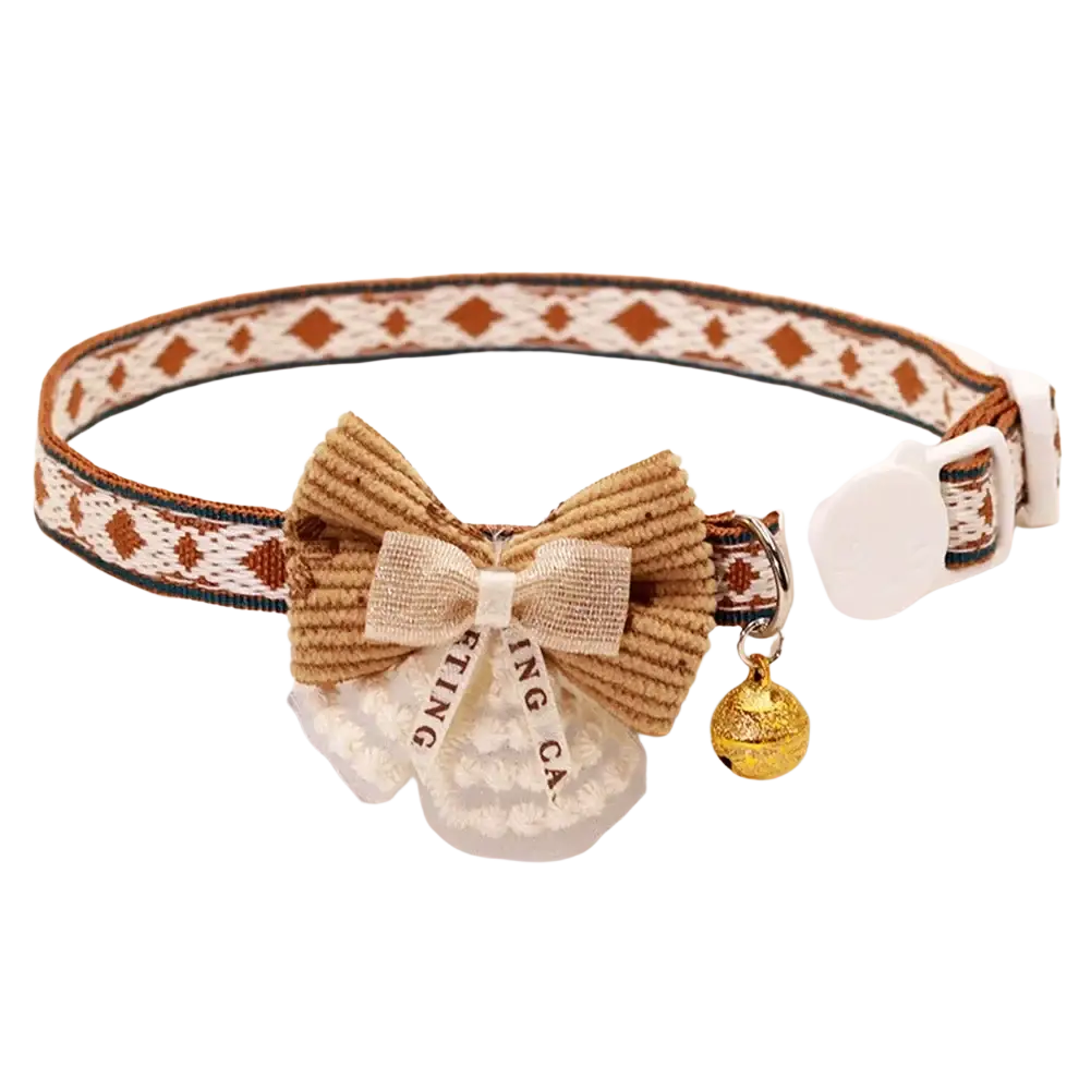 Adjustable floral cat collar with bell featuring a charming brown corduroy bow and adjustable length geometric pattern