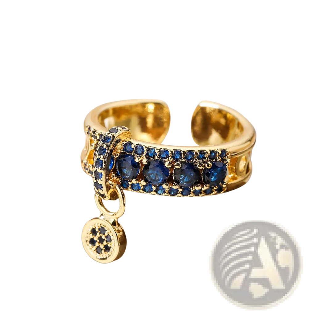 Adjustable geometric gold open ring with deep blue zircon crystals and a dangling circular charm with black stones