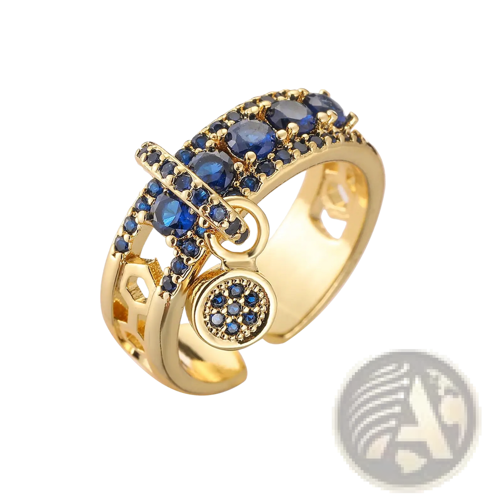 Adjustable geometric gold open ring with deep blue zircon gemstones and an ornate circular pendant charm