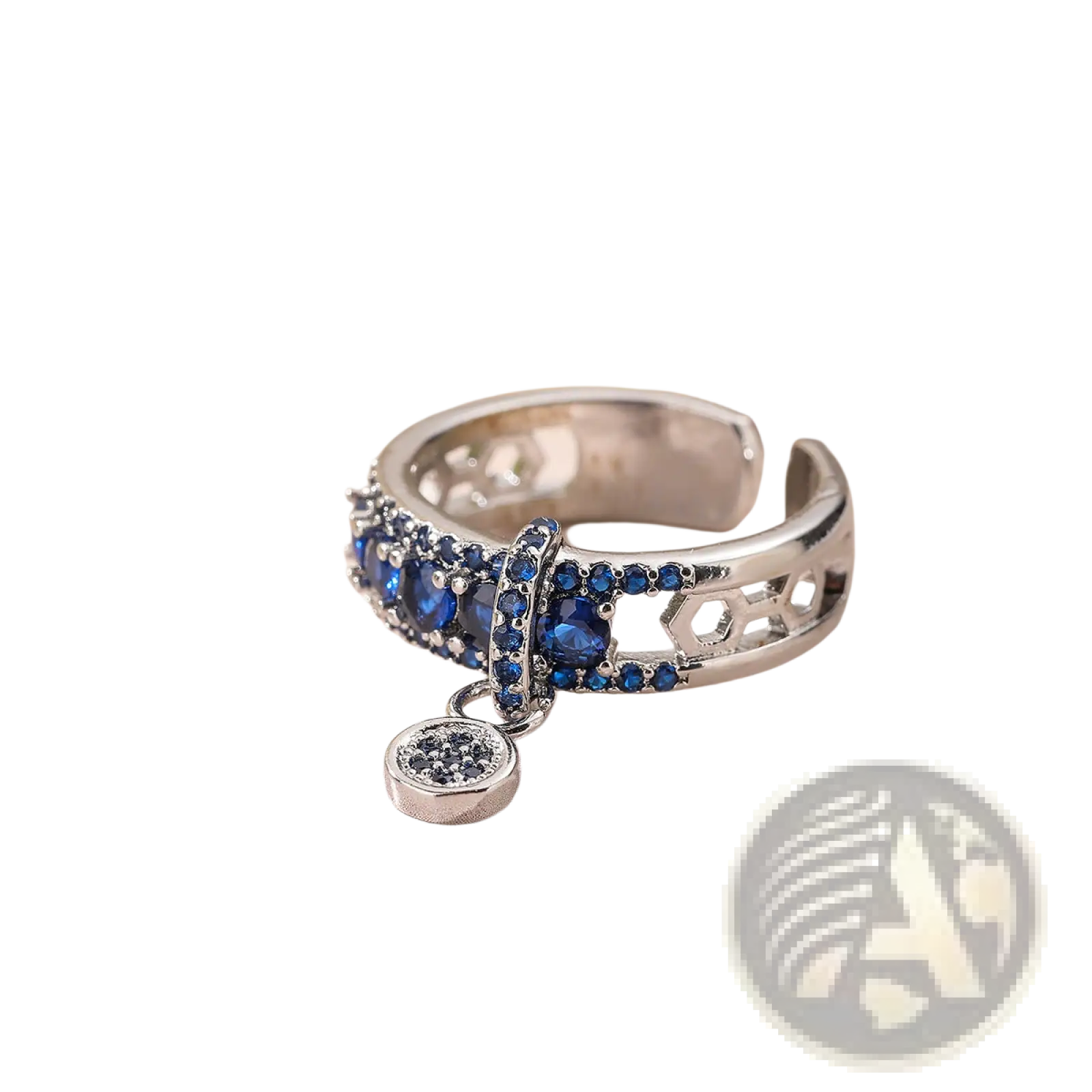Adjustable silver open-band ring with deep blue gemstones, intricate hexagonal pattern, and black stone charm