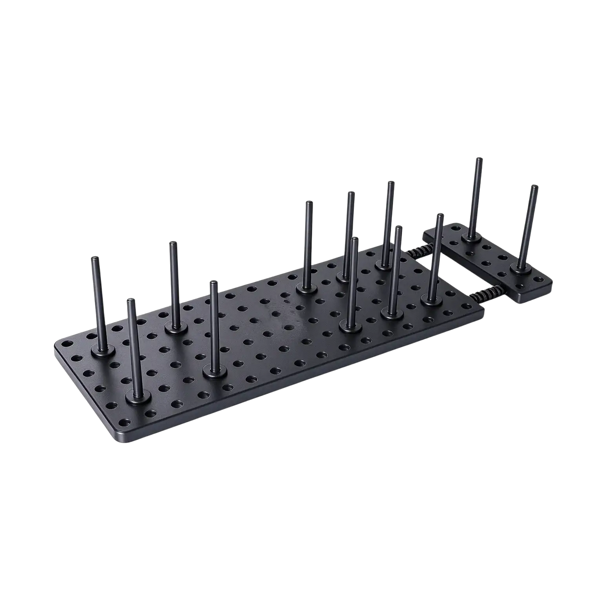 Adjustable kitchen drawer pegboard organizer in black metal with evenly spaced vertical pins and a perforated surface