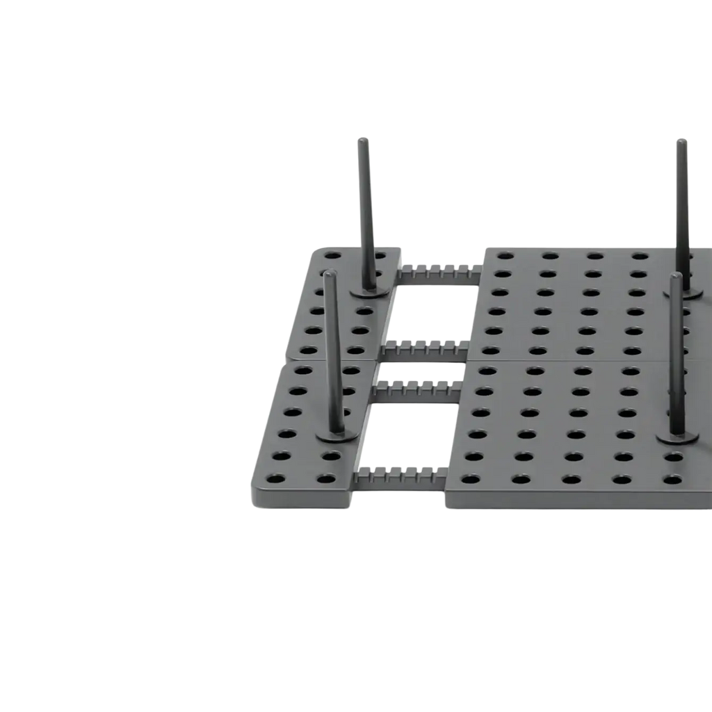 Black plastic adjustable kitchen drawer pegboard organizer with silicone feet for stability and non-slip use