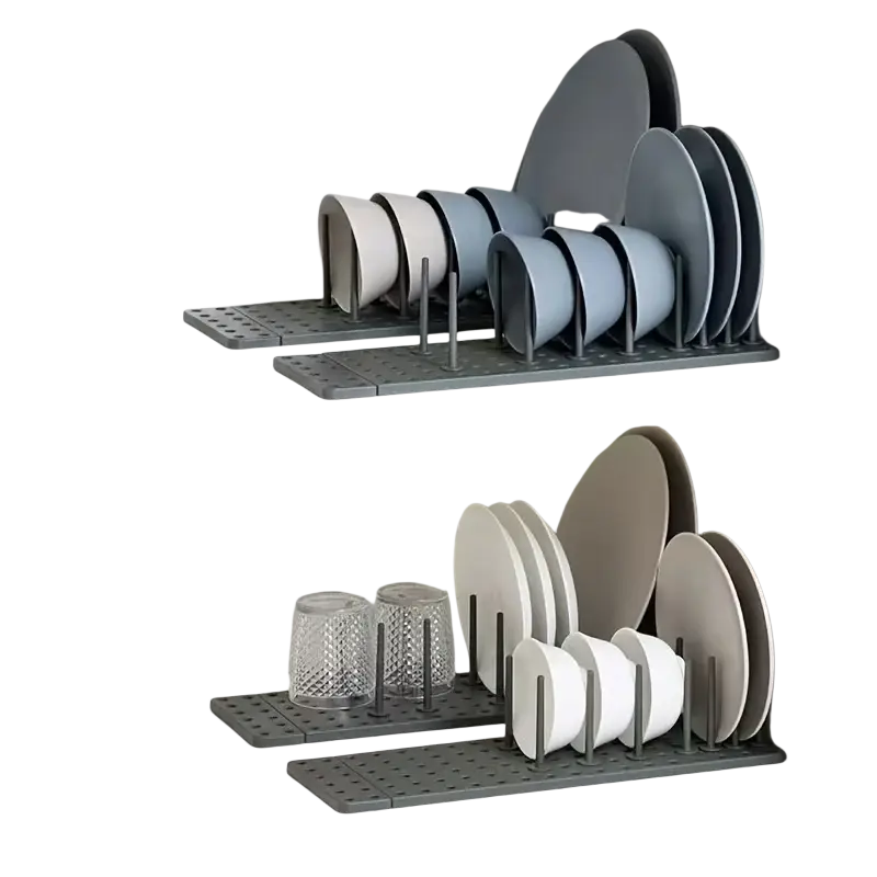 Gray plastic adjustable kitchen drawer pegboard organizer with vertical slots holding plates and bowls