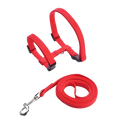 Adjustable nylon cat harness and leash set in red woven fabric with black plastic buckles and silver metal clasp