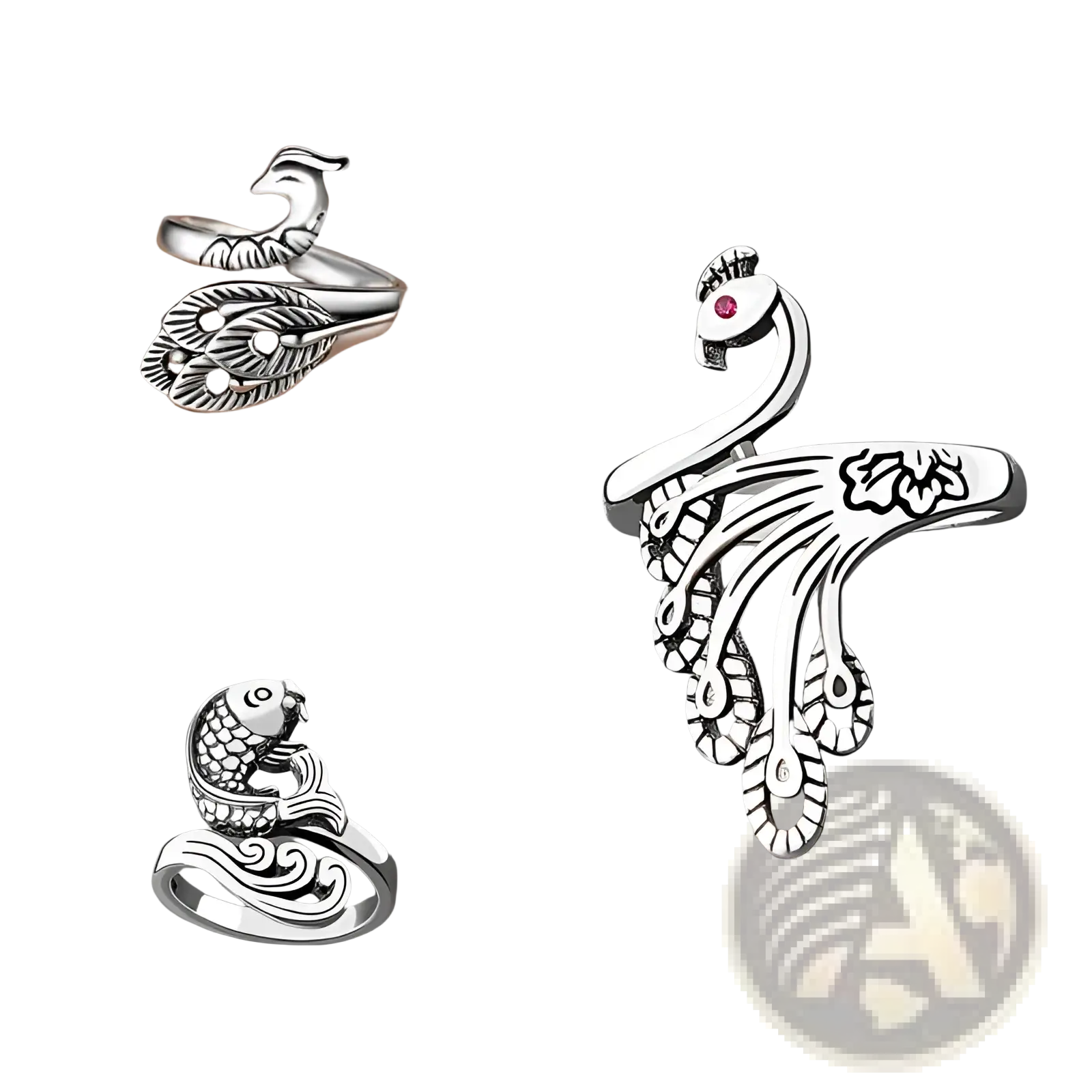Adjustable silver peacock-themed ring with intricate feather detailing and small red gemstone in the eye