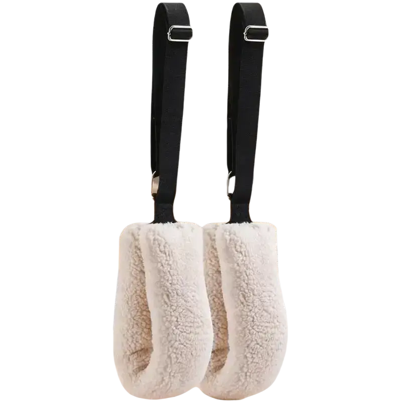 Adjustable pilates straps with cream-colored plush fleece hand grips and black adjustable straps for comfort and support