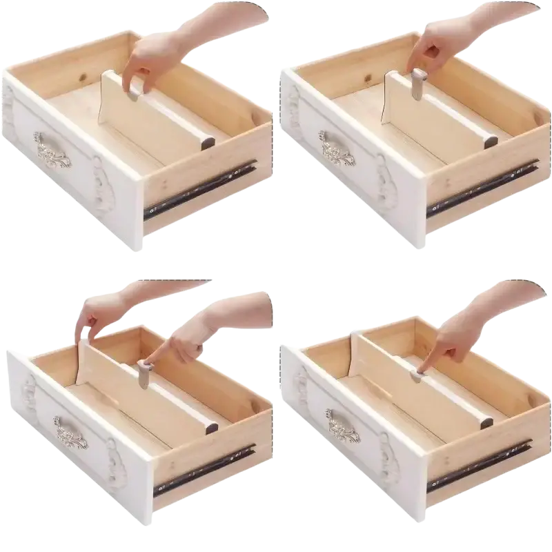 White wooden drawer organizer with ornate silver handles and black metal slides featuring adjustable plastic dividers