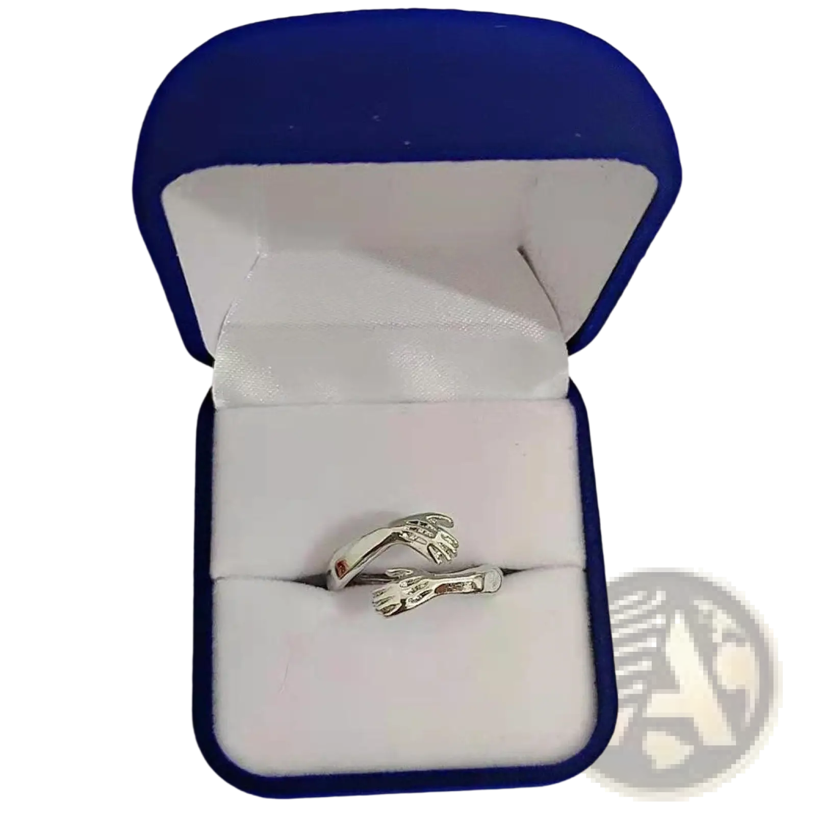 Adjustable silver ring featuring two interlocking hands with a small red gemstone accent
