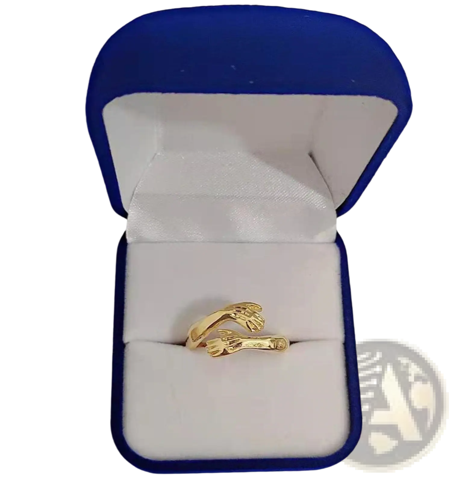 Gold-colored adjustable ring featuring two interlocking hands in a delicate sculpted design with a red gemstone