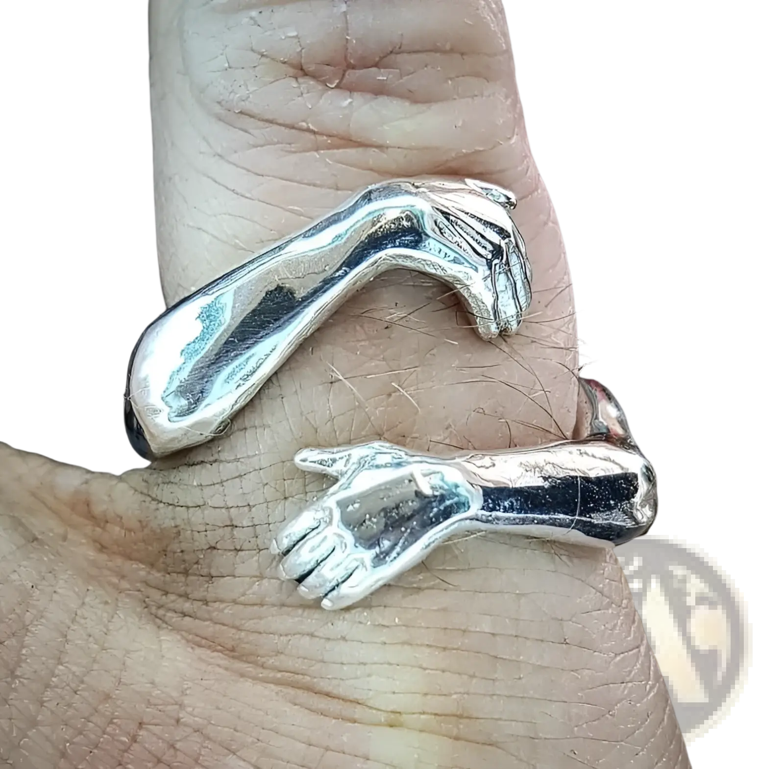 Adjustable silver ring with two intricately detailed hands clasping each other and a red gemstone centerpiece
