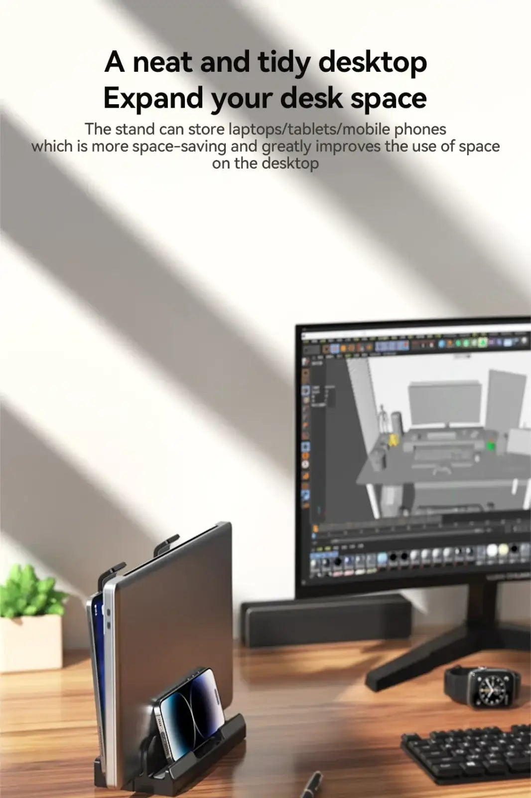Black plastic adjustable vertical laptop stand and holder supporting a laptop and smartphone on a desk