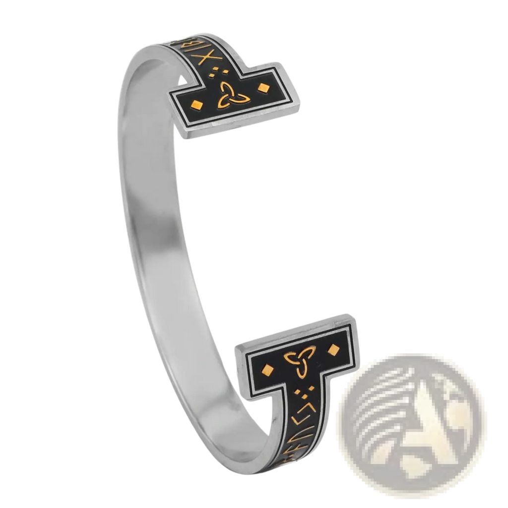 Silver-toned adjustable Viking rune titanium steel open cuff bracelet with black panels and gold Norse runes and triquetra symbol