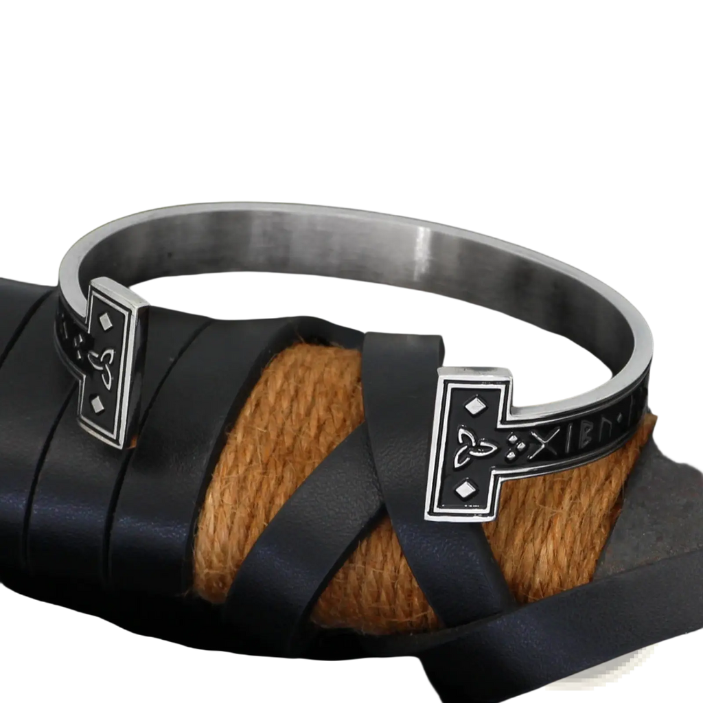 Silver-toned adjustable viking rune titanium steel open cuff bracelet with black inlaid runes and celtic knot rectangular ends
