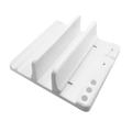 White plastic adjustable width laptop and tablet stand with two vertical slots and three circular holes on base showing opening size