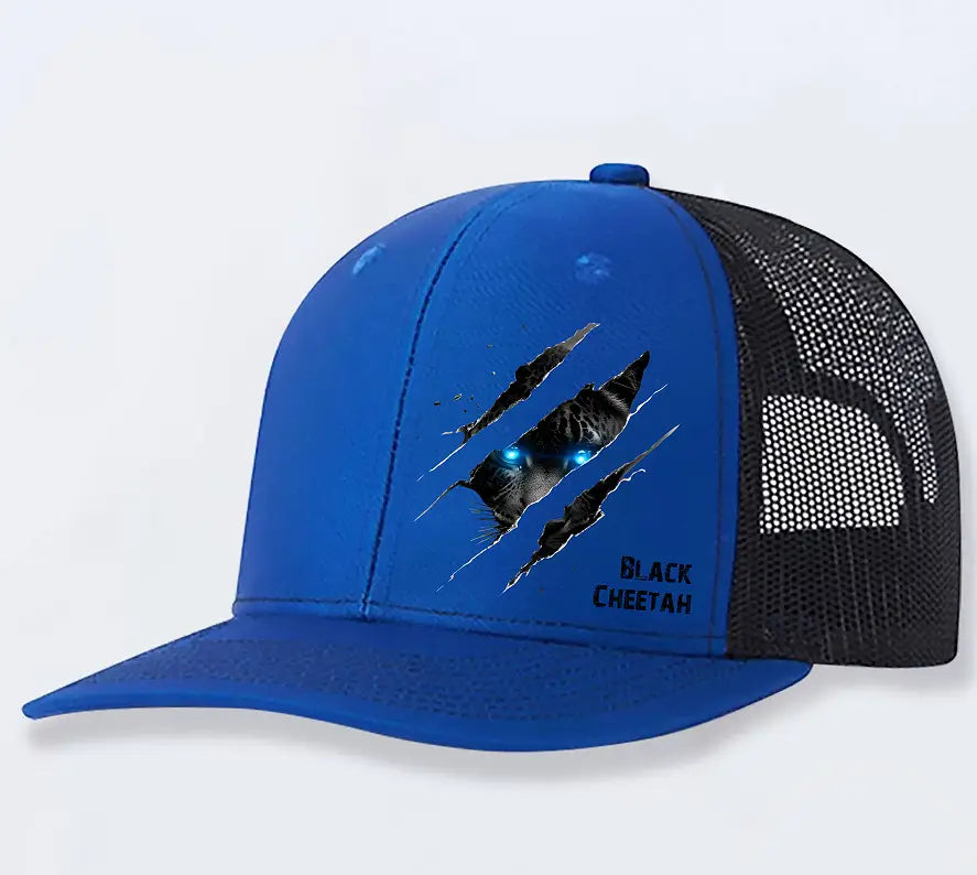 Vibrant blue polyester cheetah graphic trucker hat for men featuring a black mesh back and front panel with a black cheetah face emerging from torn fabric and glowing blue eyes.
