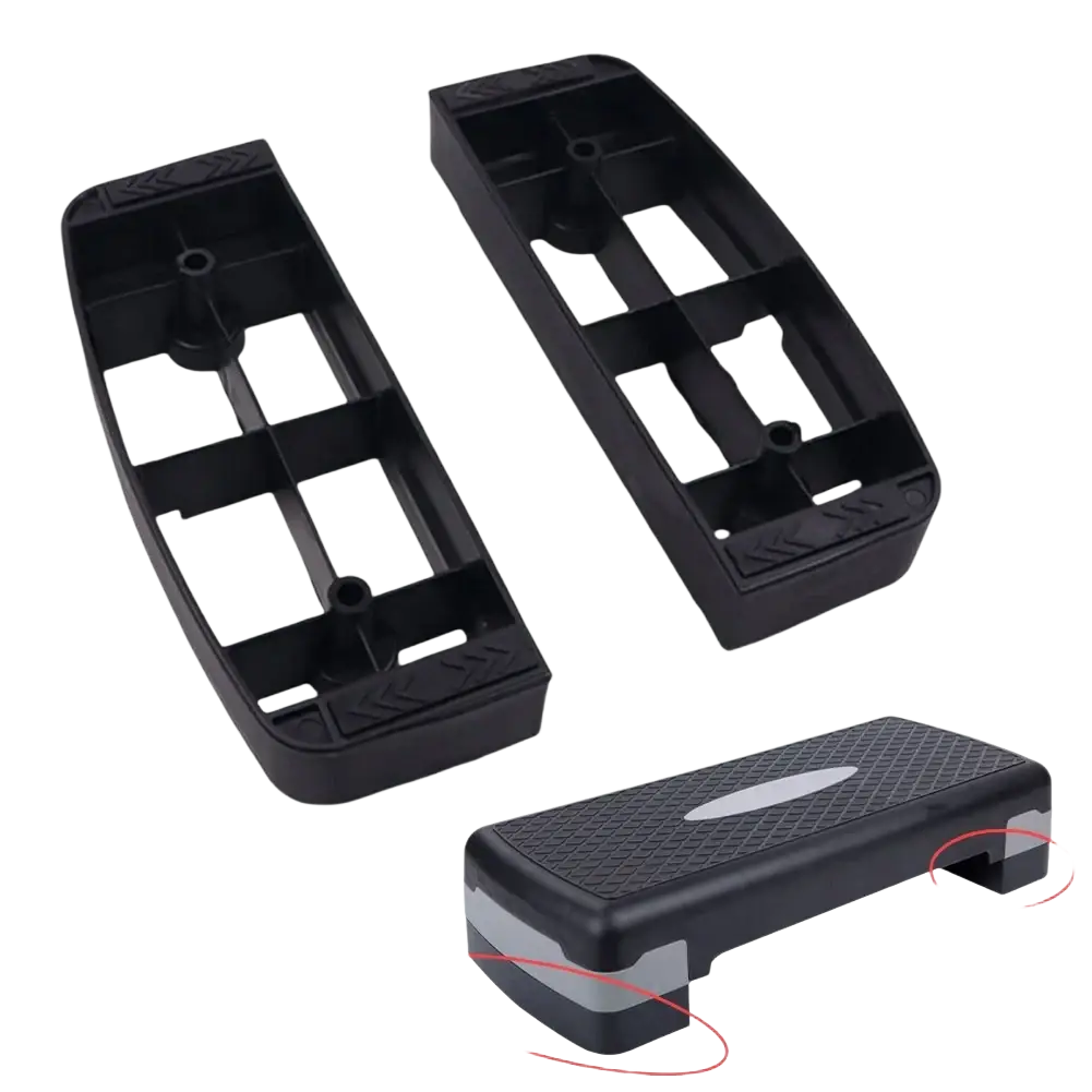 Black plastic aerobic stepper platform base with textured grip surface and gray accent strip for home fitness