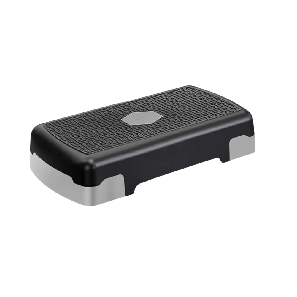 Aerobic stepper platform for home workout fitness with black and silver frame and textured patterned top surface