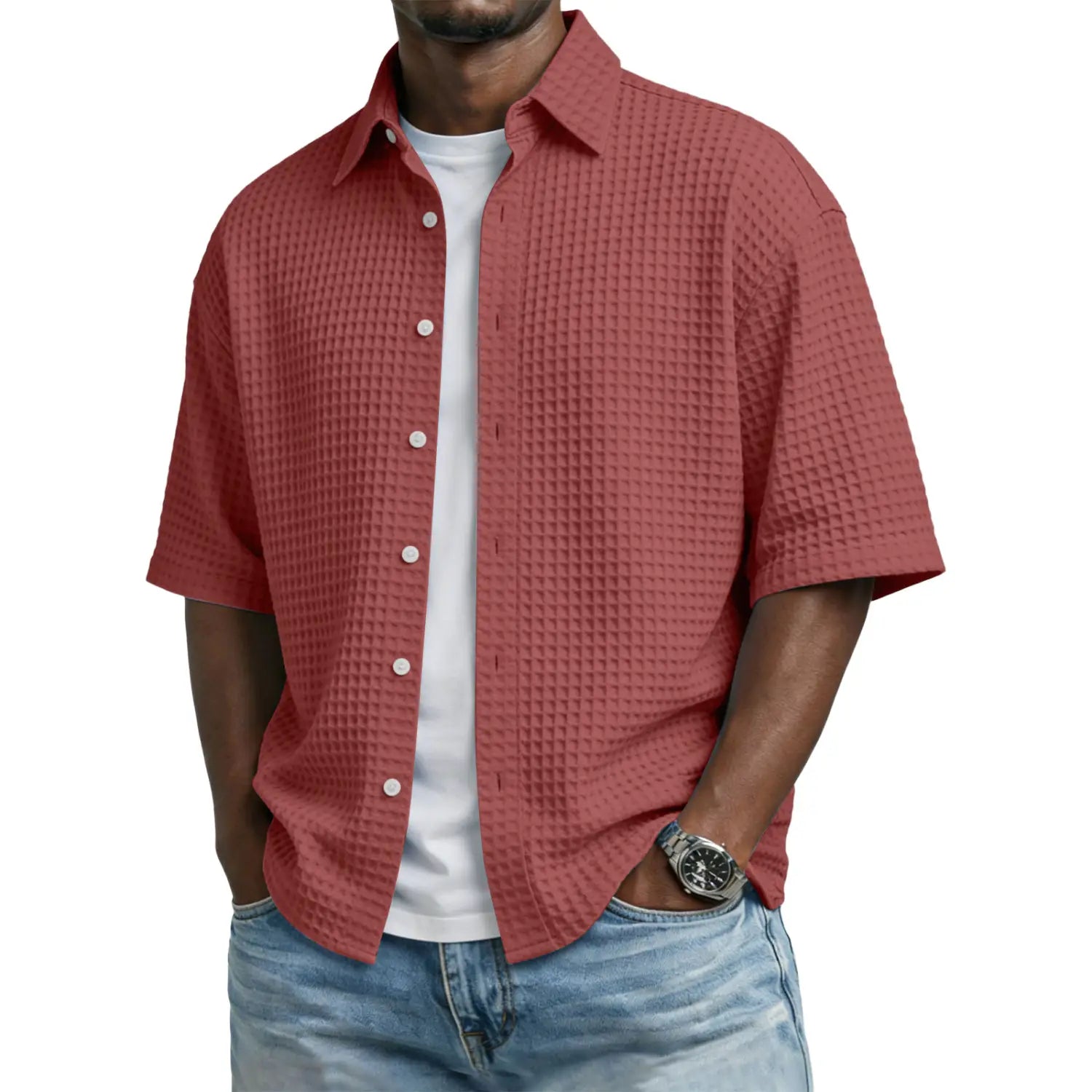 Men’s short-sleeved button-up shirt in textured reddish-pink waffle knit fabric.