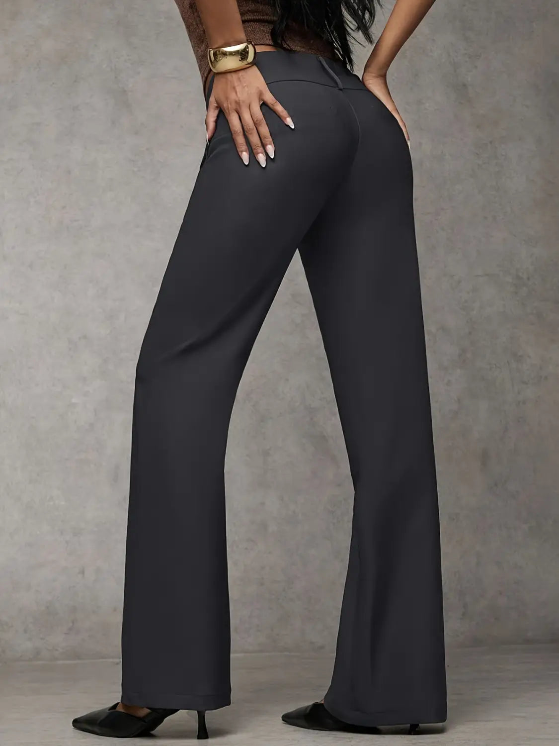 dark gray high-waisted flared trousers with a sleek tailored fit designed as wide leg work pants for casual wear