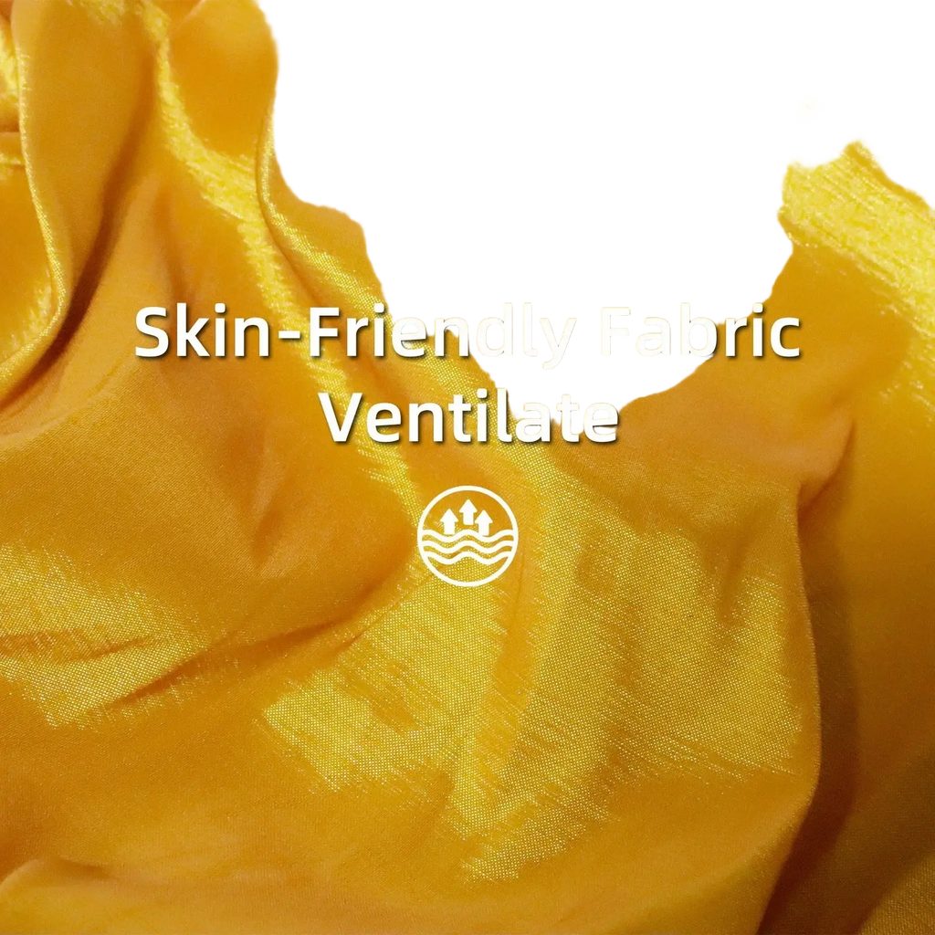 African turban auto gele headwrap made of golden shiny fabric with smooth texture and subtle sheen