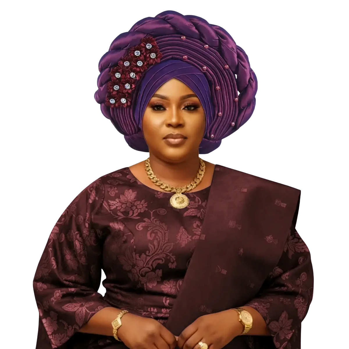 Purple braided African turban auto gele headwrap adorned with floral embellishments and sparkling rhinestones
