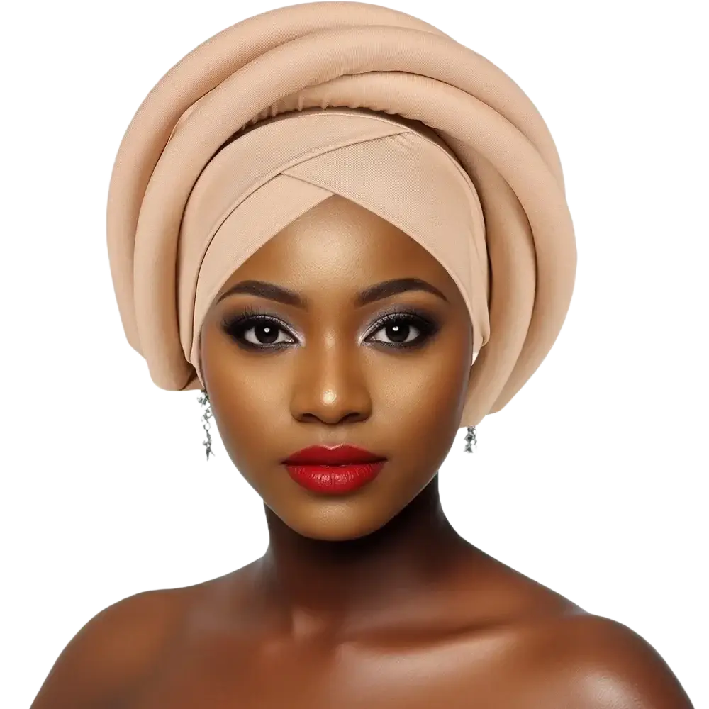 Beige twisted African women turban head wrap with soft draped folds and smooth fabric finish