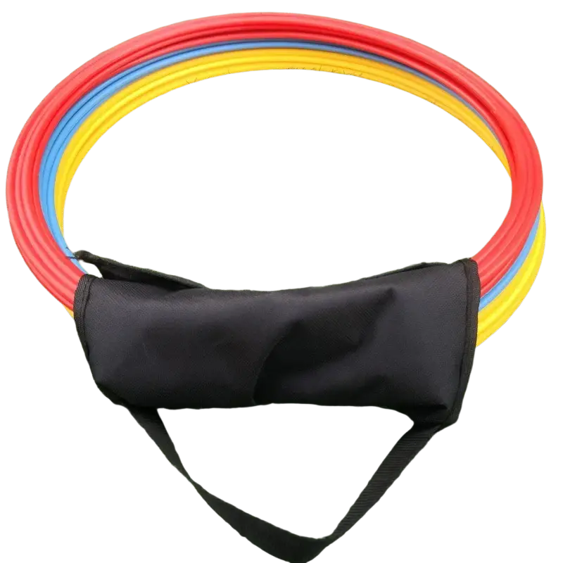 Set of red yellow and blue plastic agility hoops stored in a black oxford cloth carrying bag for easy transport