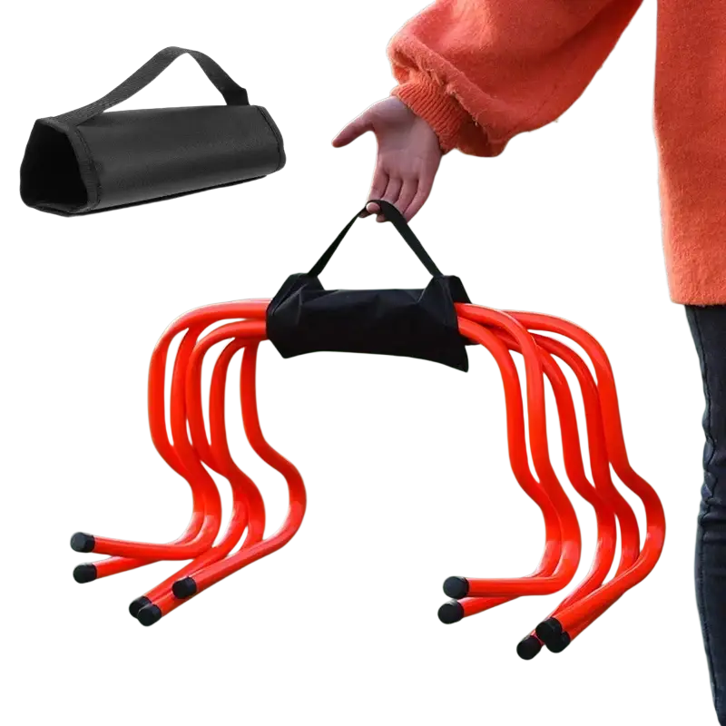 Bright orange collapsible agility ladder with black rubber feet and matching carrying bag for training use