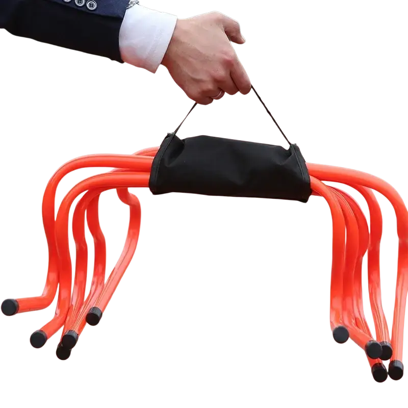 Agility ladder and hurdle training set with bright orange plastic rungs and black fabric carrying strap