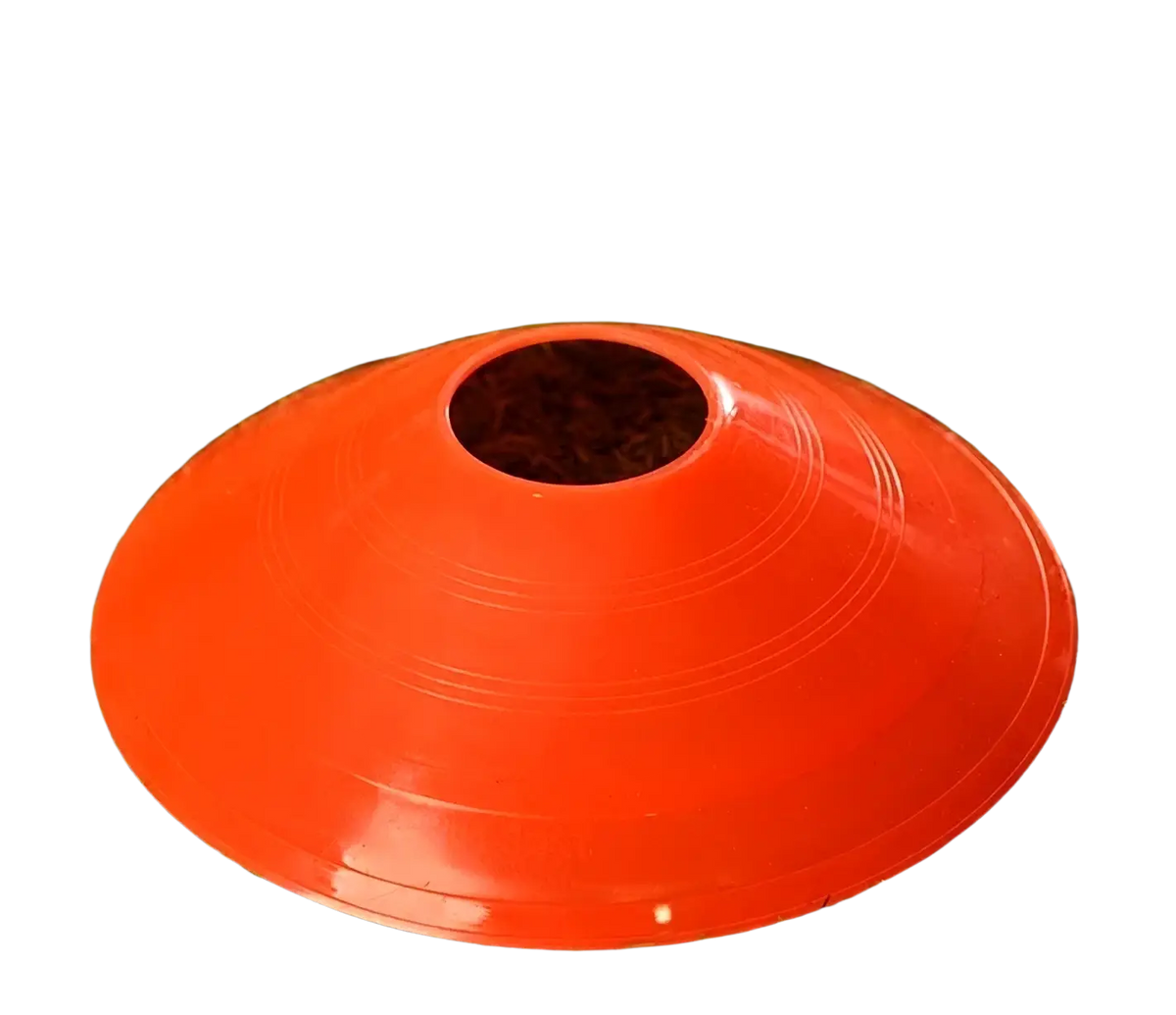 Bright orange plastic agility soccer training cone with central hole and concentric circular ridges for drills