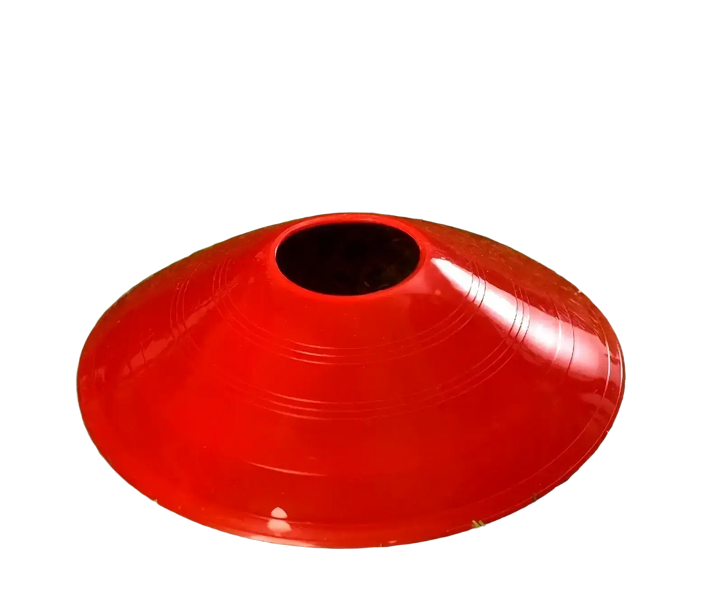 Vibrant red glossy plastic agility soccer training cone with central hole and concentric ridges for soccer training