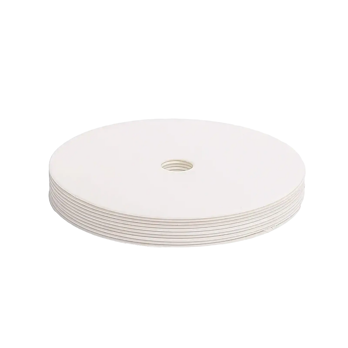 Stack of white circular sanding discs with central holes used as agility training cones and sports marker discs