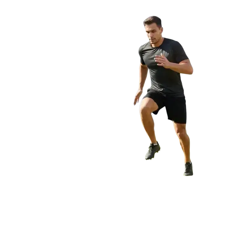 A man in black athletic wear using a black agility training equipment speed ladder with nylon straps for agility training