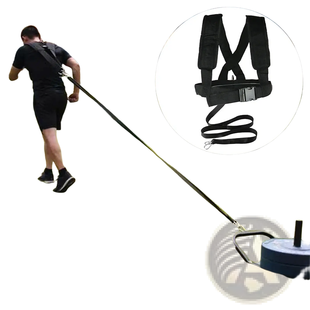 Black resistance training harness with adjustable straps and metal buckle connected to weighted sled for agility training