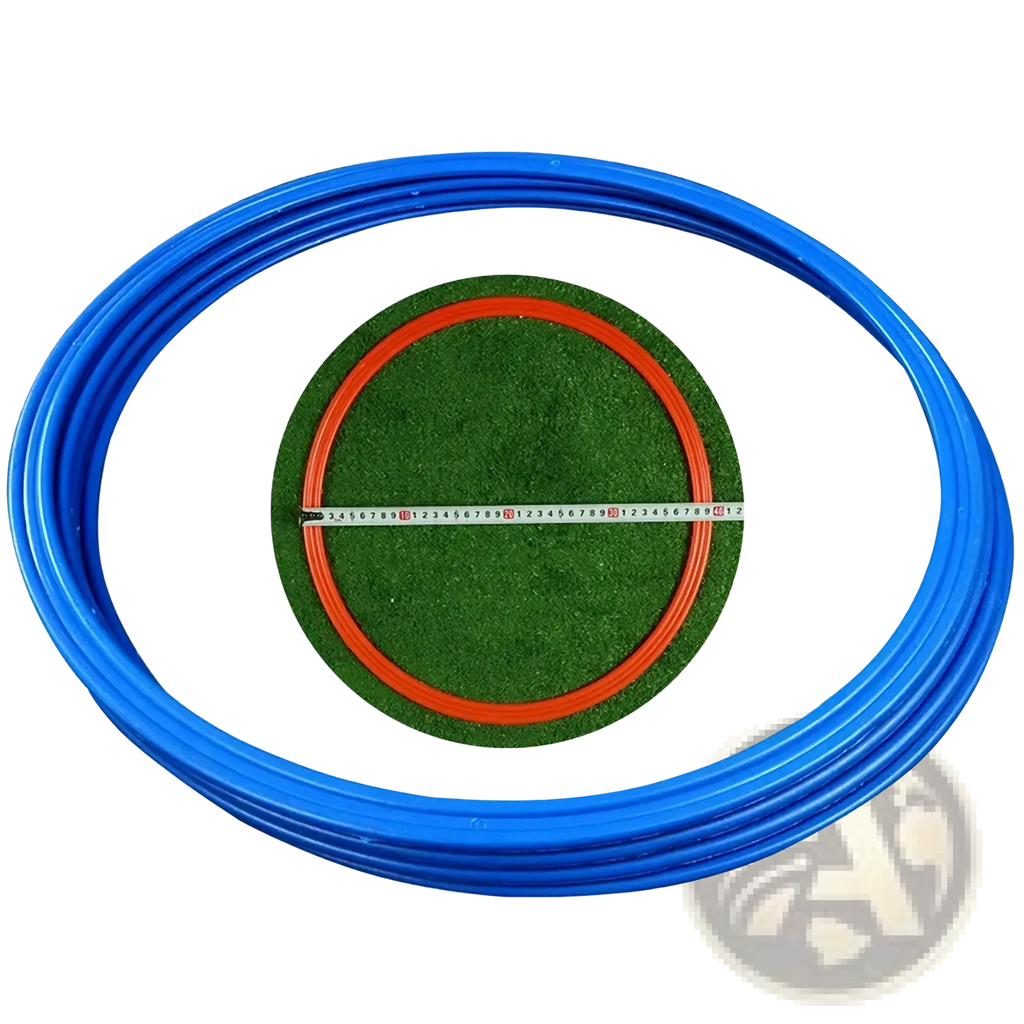 Blue plastic agility training ring with a green artificial grass center and orange inner ring for soccer speed exercise