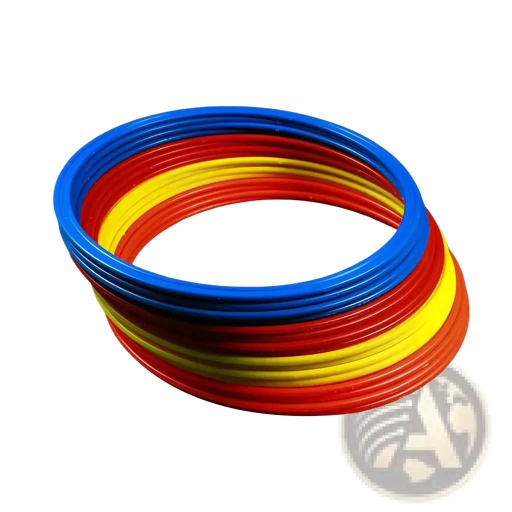 Stack of colorful blue red and yellow plastic agility training rings for soccer speed exercise equipment
