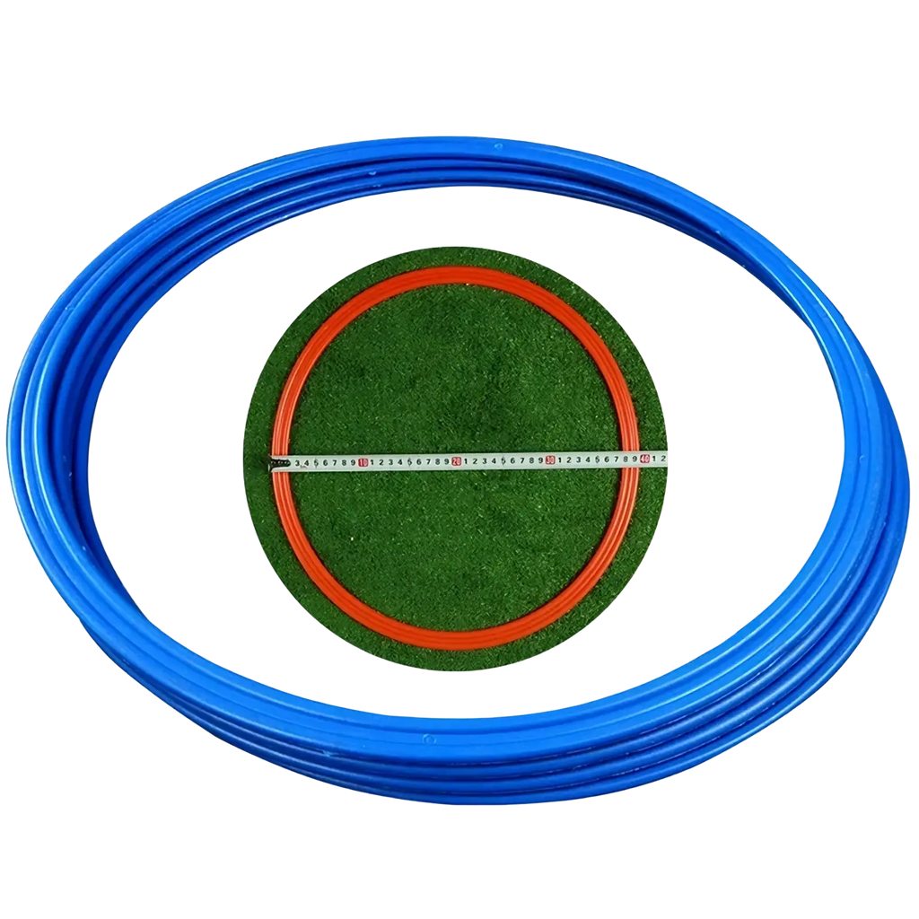 Blue plastic agility training ring with a green artificial grass center and orange inner ring for soccer speed exercise