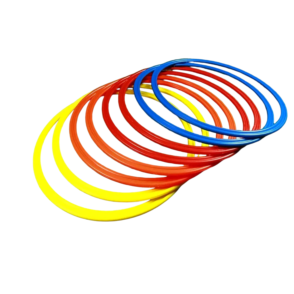 Set of colorful plastic agility training rings in yellow red and blue for soccer speed and exercise equipment