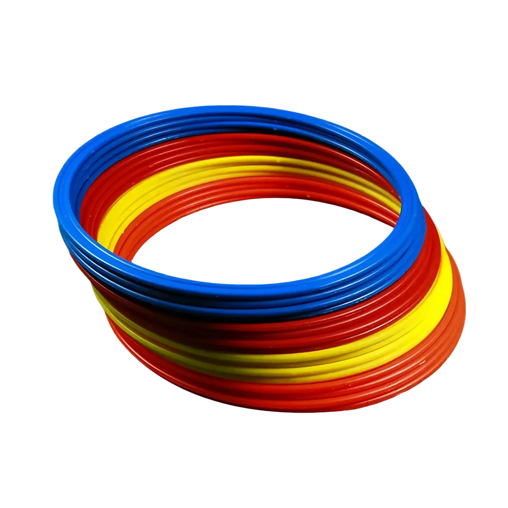 Stack of colorful blue red and yellow plastic agility training rings for soccer speed exercise equipment